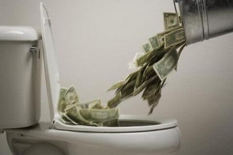 48337755-dump-money-in-toilet-gettyp.600x400