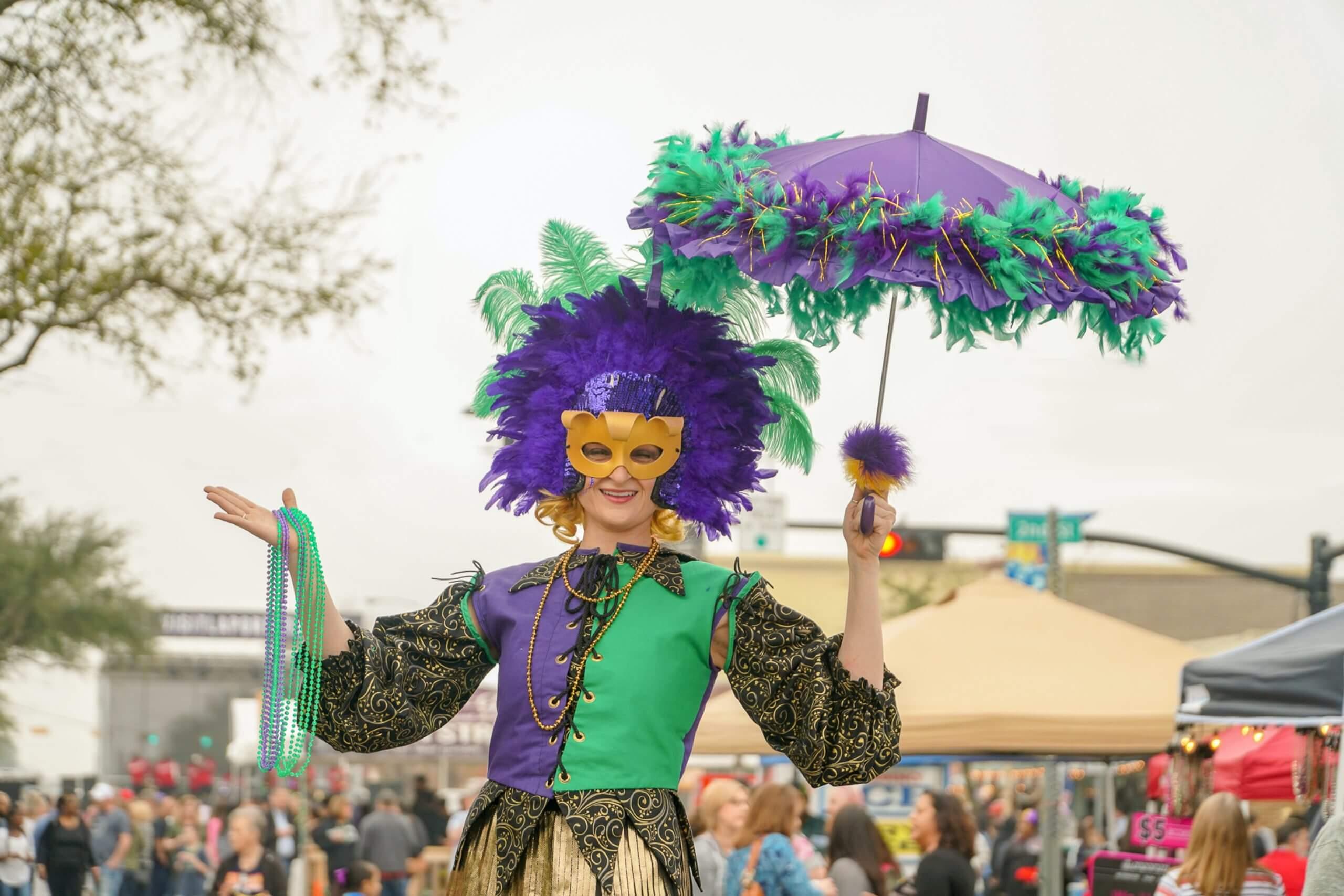 Woman dressed in Mardi Gras attire