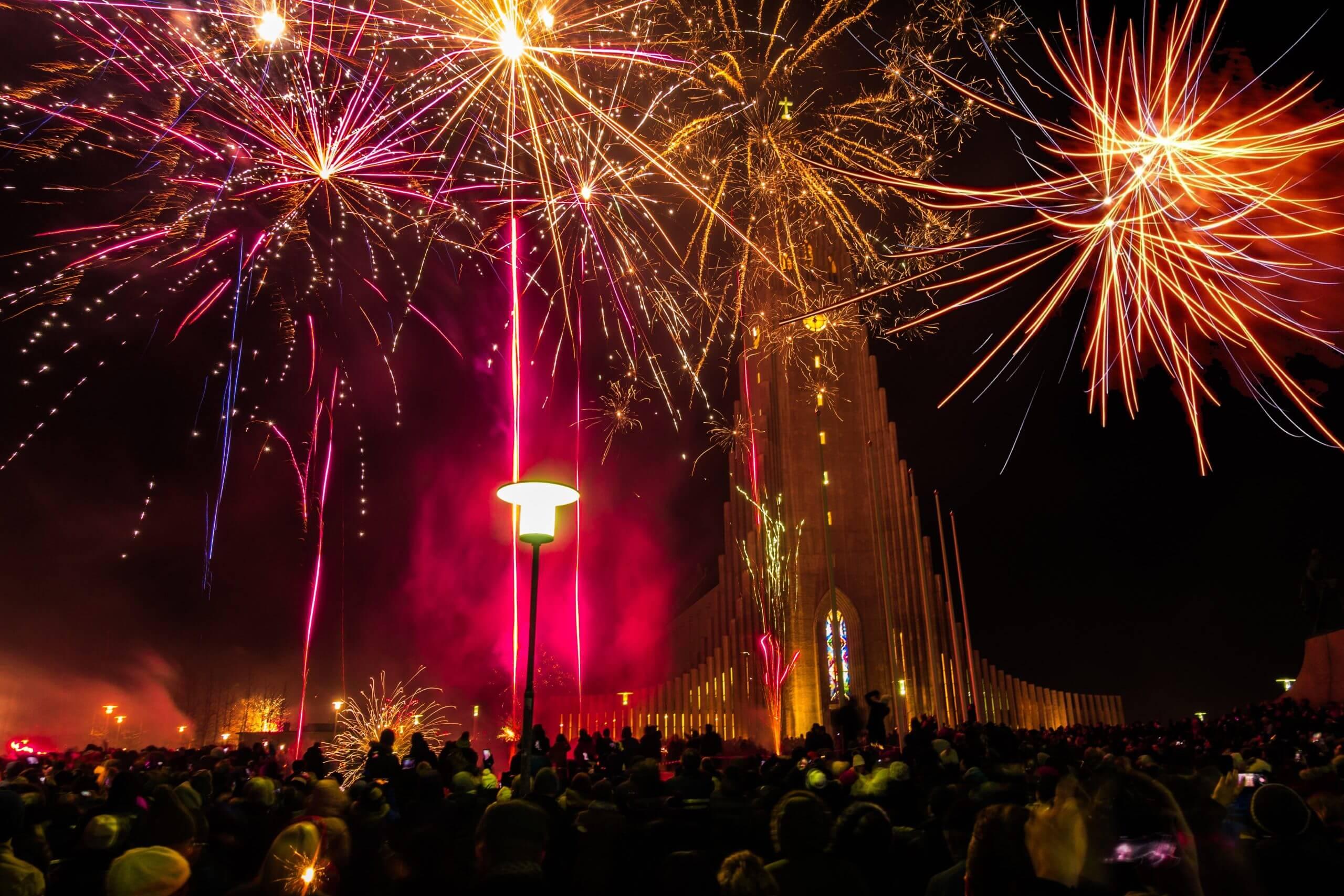 Festival of fireworks in front of Reykjavik church