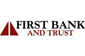 1st Bank Trust New Orleans Black&Gold Money logo
